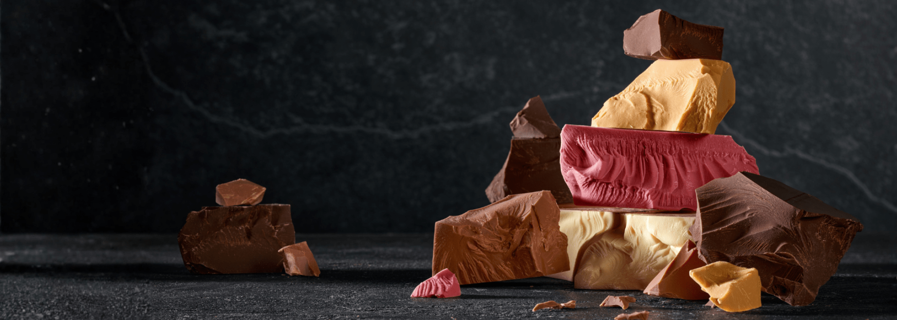 The 5 colors of chocolate on a dark background